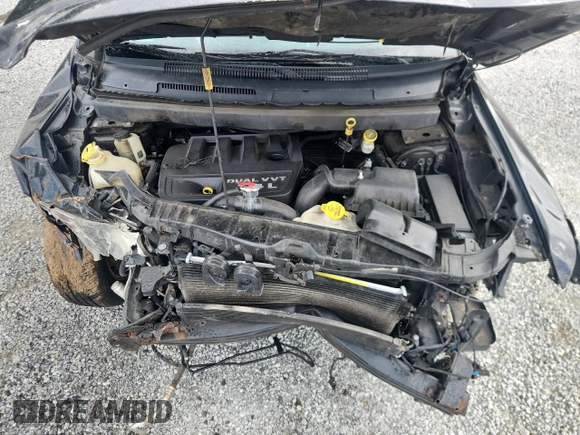 2013 Dodge Journey American Value with VIN 3C4PDCAB4DT650236, listed as a Copart auction lot 62913595 with Not provided miles and Salvage title. Bid and sale history available at DreamBid. Image 12.
