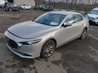 2022 Mazda 3 Premium with VIN 3MZBPADL6NM310475, listed as a IAAI auction lot 41919861 with 22,269 mi miles and . Bid and sale history available at DreamBid. Image 2.