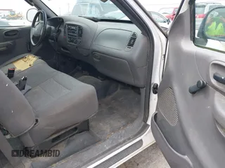 2002 Ford F-150 XL with VIN 1FTRF172X2KE34789, listed as a IAAI auction lot 42138397 with 188,960 mi miles and . Bid and sale history available at DreamBid. Image 5.