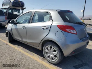 2012 Mazda Mazda2 Sport with VIN JM1DE1KZXC0152070, listed as a Copart auction lot 71793854 with 127,833 mi miles and Salvage Title. Bid and sale history available at carsss.com. Image 2.