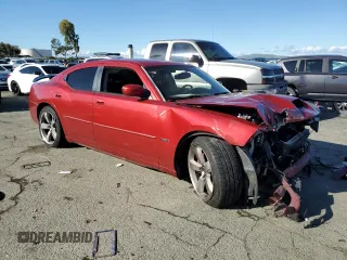 2006 Dodge Charger SRT-8 with VIN 2B3KA73W66H283699, listed as a Copart auction lot 44060975 with 126,105 mi miles and Salvage Title. Bid and sale history available at DreamBid. Image 4.