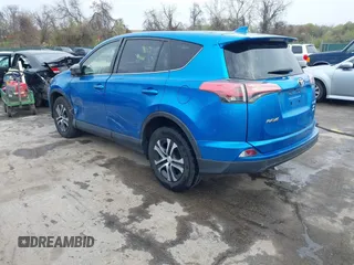 2018 Toyota RAV4 LE with VIN JTMBFREV8JJ220630, listed as a IAAI auction lot 42001795 with 86,027 mi miles. Bid and sale history available at carsss.com. Image 3.