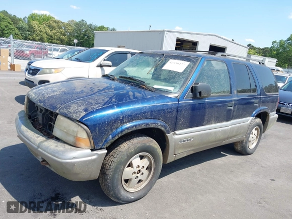 2001 GMC Jimmy SLE z VIN 1GKDT13W612136433, wystawiony jako IAAI lot #42336277 z przebiegiem Nie podano mil oraz . Historia ofert i sprzedaży dostępna na DreamBid. Obrazek 2.
