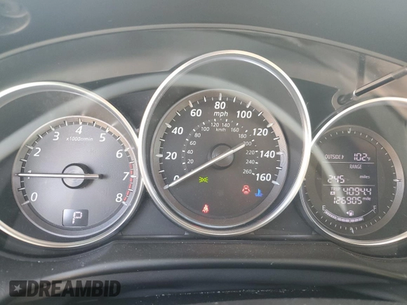 2014 Mazda CX-5 Sport with VIN JM3KE2BE9E0344990, listed as a Copart auction lot 59014145 with 126,905 mi miles and Salvage title. Bid and sale history available at DreamBid. Image 9.