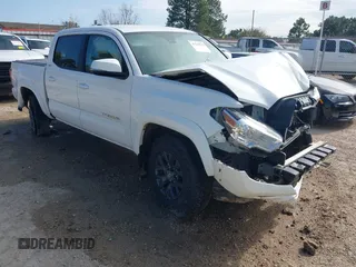 2020 Toyota Tacoma SR5 with VIN 3TMCZ5ANXLM296320, listed as a IAAI auction lot 41229819 with 74,967 mi miles and . Bid and sale history available at DreamBid. Image 1.