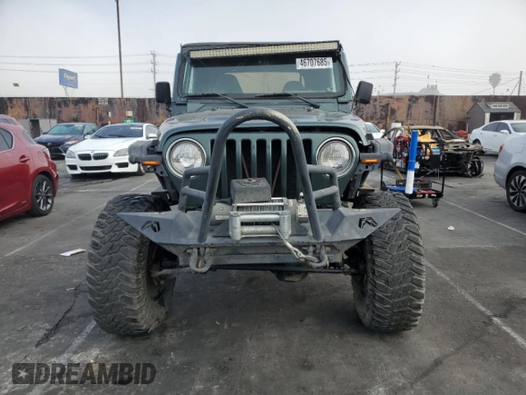 2002 Jeep Wrangler Sahara with VIN 1J4FA59S42P742978, listed as a Copart auction lot 46707685 with 77,272 mi miles and Salvage Title. Bid and sale history available at carsss.com. Image 5.