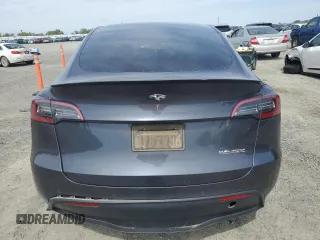 2021 Tesla Model Y Performance with VIN 5YJYGDEF2MF262273, listed as a Copart auction lot 50569245 with 90,879 mi miles and Salvage Title. Bid and sale history available at DreamBid. Image 6.