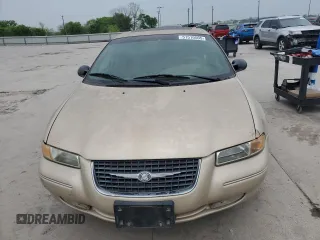 1999 Chrysler Cirrus LXi z VIN 1C3EJ56H6XN540760, wystawiony jako Copart lot #51510505 z przebiegiem Nie podano mil oraz Czysty tytuł • Clean title. Historia ofert i sprzedaży dostępna na DreamBid. Obrazek 5.