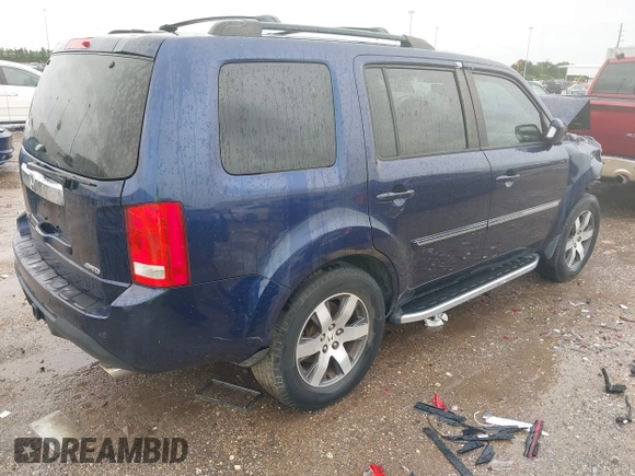 2013 Honda Pilot Touring with VIN 5FNYF4H95DB007125, listed as a IAAI auction lot 42493693 with Not provided miles and . Bid and sale history available at DreamBid. Image 4.