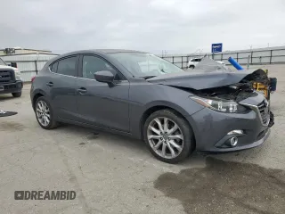 2016 Mazda 3 S Touring with VIN JM1BM1M3XG1299797, listed as a Copart auction lot 54344485 with Not provided miles and Salvage title. Bid and sale history available at DreamBid. Image 4.