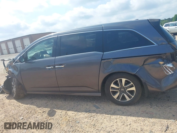 2015 Honda Odyssey Touring Elite with VIN 5FNRL5H95FB127156, listed as a IAAI auction lot 42618059 with 160,074 mi miles and . Bid and sale history available at DreamBid. Image 14.