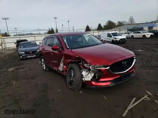 2021 Mazda CX-5 Grand Touring with VIN JM3KFBDM2M0434594, listed as a Copart auction lot 43135775 with 33,736 mi miles and Salvage Title. Bid and sale history available at carsss.com. Image 12.