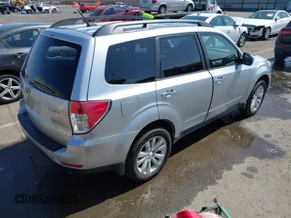 2012 Subaru Forester X Premium with VIN JF2SHADC9CH403834, listed as a IAAI auction lot 42477876 with 193,064 mi miles and . Bid and sale history available at DreamBid. Image 4.