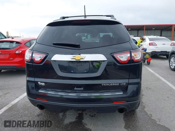 2014 Chevrolet Traverse LTZ with VIN 1GNKRJKD1EJ203282, listed as a IAAI auction lot 41984380 with 219,819 mi miles and . Bid and sale history available at DreamBid. Image 16.