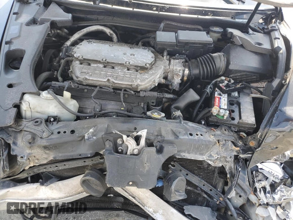 2005 Acura RL z VIN JH4KB16565C019863, wystawiony jako Copart lot #55317535 z przebiegiem 213 732 mil mil oraz Szkoda całkowita • Salvage title. Historia ofert i sprzedaży dostępna na DreamBid. Obrazek 11.