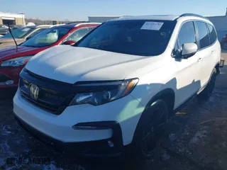 2021 Honda Pilot Special Edition with VIN 5FNYF5H21MB008197, listed as a IAAI auction lot 41282376 with 72,910 mi miles. Bid and sale history available at carsss.com. Image 2.