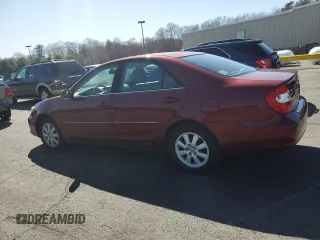 2004 Toyota Camry LE with VIN 4T1BE30KX4U297754, listed as a Copart auction lot 50795425 with 184,152 mi miles and Salvage Title. Bid and sale history available at DreamBid. Image 2.