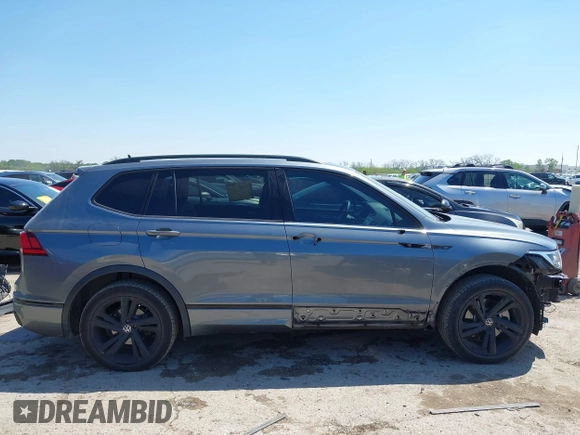2023 Volkswagen Tiguan SE R-Line Black z VIN 3VVCB7AX1PM057201, wystawiony jako IAAI lot #41977239 z przebiegiem 84 840 mil mil oraz . Historia ofert i sprzedaży dostępna na DreamBid. Obrazek 14.