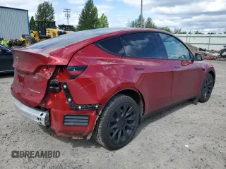 2024 Tesla Model Y Long Range with VIN 7SAYGDEE3RF196043, listed as a Copart auction lot 55693765 with 13,865 mi miles and Salvage title. Bid and sale history available at DreamBid. Image 3.