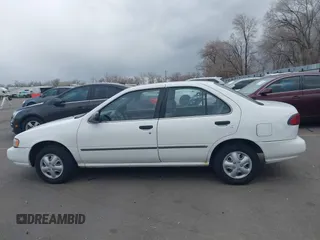 1996 Nissan Sentra XE z VIN 3N1AB41D2TL013267, wystawiony jako IAAI lot #41505728 z przebiegiem 232 387 mil mil oraz . Historia ofert i sprzedaży dostępna na DreamBid. Obrazek 14.