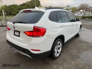 2013 BMW X1 28i with VIN WBAVM1C54DVW42766, listed as a Copart auction lot 54416745 with 121,067 mi miles and Clean Title. Bid and sale history available at carsss.com. Image 4.