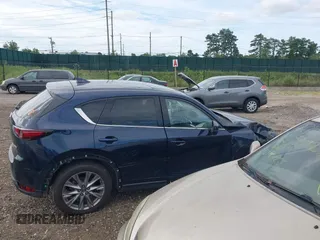 2019 Mazda CX-5 Grand Touring with VIN JM3KFBDM8K1521231, listed as a IAAI auction lot 42738963 with 32,179 mi miles and . Bid and sale history available at DreamBid. Image 13.