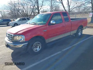1999 Ford F-150 with VIN 1FTZX1722XNA89017, listed as a IAAI auction lot 41606478 with Not provided miles and . Bid and sale history available at DreamBid. Image 2.