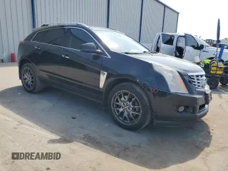 2014 Cadillac SRX Premium Collection with VIN 3GYFNDE35ES591071, listed as a Copart auction lot 57891265 with 134,560 mi miles and Salvage title. Bid and sale history available at DreamBid. Image 4.