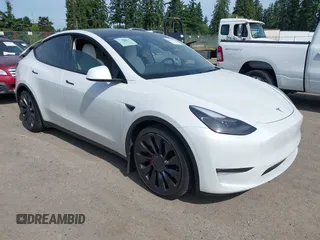 2022 Tesla Model Y Performance z VIN 7SAYGDEF6NF340932, wystawiony jako IAAI lot #42447794 z przebiegiem 53 622 mil mil oraz . Historia ofert i sprzedaży dostępna na DreamBid. Obrazek 1.