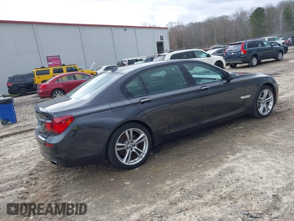 2014 BMW 7 Series 740Li with VIN WBAYE4C56ED138397, listed as a IAAI auction lot 41726117 with 116,291 mi miles. Bid and sale history available at carsss.com. Image 4.