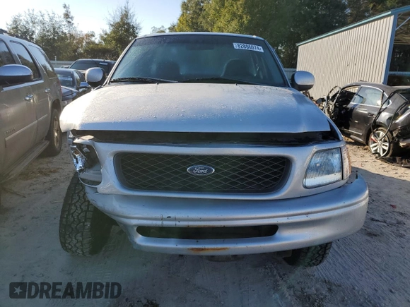 1998 Ford F-150 with VIN 2FTZF07W8WCA96137, listed as a Copart auction lot 82886074 with 181,690 mi miles and Salvage title. Bid and sale history available at DreamBid. Image 5.