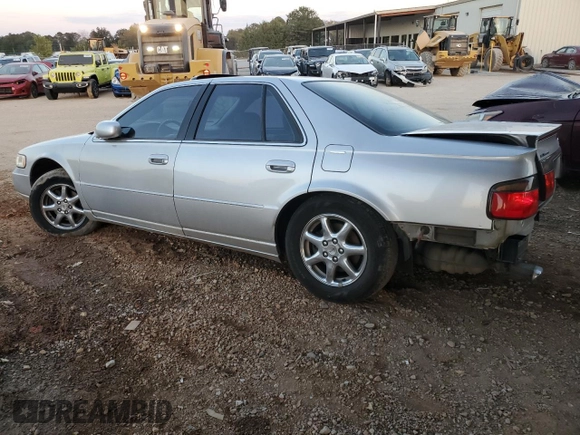 2000 Cadillac Seville Touring STS z VIN 1G6KY5494YU201138, wystawiony jako Copart lot #73485584 z przebiegiem 137 913 mil mil oraz Szkoda całkowita • Salvage title. Historia ofert i sprzedaży dostępna na DreamBid. Obrazek 2.