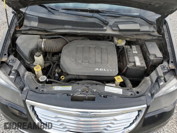 2013 Chrysler Town & Country Touring with VIN 2C4RC1BG2DR559690, listed as a Copart auction lot 52095855 with 254,704 mi miles and Salvage Title. Bid and sale history available at carsss.com. Image 12.