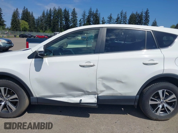 2018 Toyota RAV4 XLE with VIN JTMWFREV3JD130995, listed as a IAAI auction lot 42183630 with 56,624 mi miles. Bid and sale history available at carsss.com. Image 15.