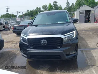 2023 Honda Ridgeline RTL-E with VIN 5FPYK3F76PB042100, listed as a IAAI auction lot 42274861 with 16,822 mi miles and . Bid and sale history available at DreamBid. Image 12.