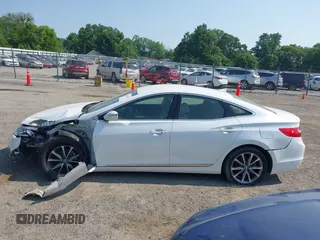 2015 Hyundai Azera z VIN KMHFG4JG3FA447672, wystawiony jako IAAI lot #42474930 z przebiegiem 125 425 mil mil oraz . Historia ofert i sprzedaży dostępna na DreamBid. Obrazek 14.
