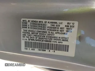2012 Honda Odyssey Touring with VIN 5FNRL5H92CB108690, listed as a IAAI auction lot 41826580 with 150,327 mi miles and . Bid and sale history available at DreamBid. Image 9.
