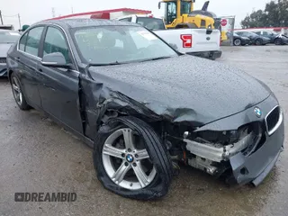 2015 BMW 3 Series 328i with VIN WBA3C1C58FP116576, listed as a IAAI auction lot 41733828 with 88,561 mi miles and . Bid and sale history available at carsss.com. Image 1.