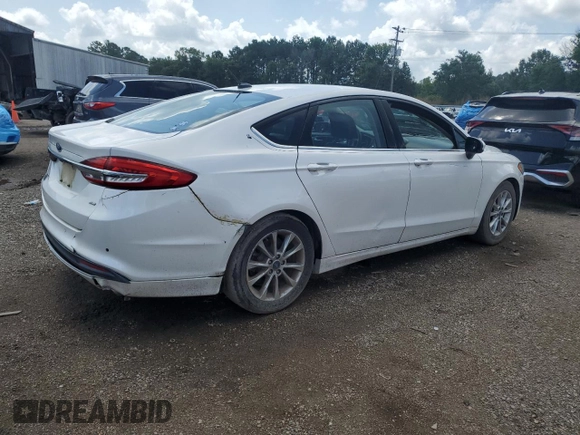 2017 Ford Fusion SE с VIN 3FA6P0H75HR392711, выставлен на аукционе Copart как лот 61758105 с пробегом 166 348 миль миль и Чистый • Clean title. История ставок и продаж доступна на DreamBid. Изображение 3.