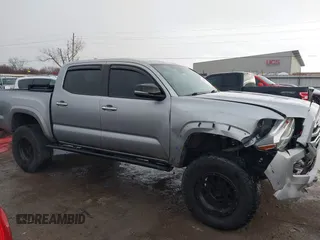 2018 Toyota Tacoma SR with VIN 5TFGZ5AN4JX142565, listed as a IAAI auction lot 41353718 with 87,544 mi miles and . Bid and sale history available at carsss.com. Image 13.