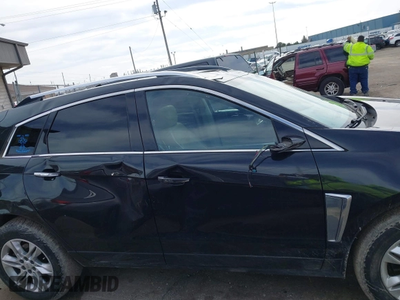 2013 Cadillac SRX Luxury Collection z VIN 3GYFNCE35DS607553, wystawiony jako IAAI lot #42151522 z przebiegiem 104 688 mil mil oraz . Historia ofert i sprzedaży dostępna na DreamBid. Obrazek 13.