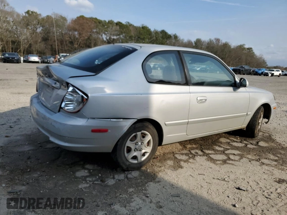 2003 Hyundai Accent GL z VIN KMHCG35CX3U270374, wystawiony jako Copart lot #47240325 z przebiegiem 122 739 mil mil oraz Szkoda całkowita • Salvage title. Historia ofert i sprzedaży dostępna na DreamBid. Obrazek 3.