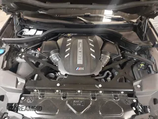2021 BMW X5 M z VIN 5YMJU0C04M9F63827, wystawiony jako IAAI lot #42351633 z przebiegiem 31 232 mil mil oraz . Historia ofert i sprzedaży dostępna na DreamBid. Obrazek 10.