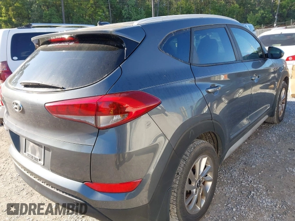 2017 Hyundai Tucson SE with VIN KM8J33A48HU413430, listed as a IAAI auction lot 41993667 with 150,736 mi miles and . Bid and sale history available at DreamBid. Image 4.