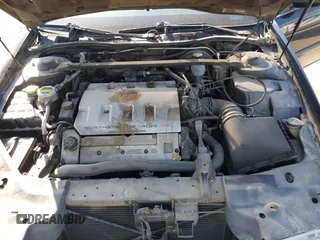 2001 Cadillac Eldorado Touring ETC z VIN 1G6ET12911B103774, wystawiony jako IAAI lot #41998828 z przebiegiem 128 724 mil mil oraz . Historia ofert i sprzedaży dostępna na DreamBid. Obrazek 10.