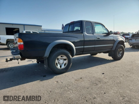 2002 Toyota Tacoma with VIN 5TEWM72NX2Z051332, listed as a Copart auction lot 66688465 with 185,611 mi miles and Clean title. Bid and sale history available at DreamBid. Image 3.