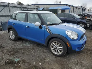 2012 MINI Countryman S with VIN WMWZC5C57CWL62540, listed as a Copart auction lot 43735105 with 86,558 mi miles and Salvage Title. Bid and sale history available at DreamBid. Image 4.