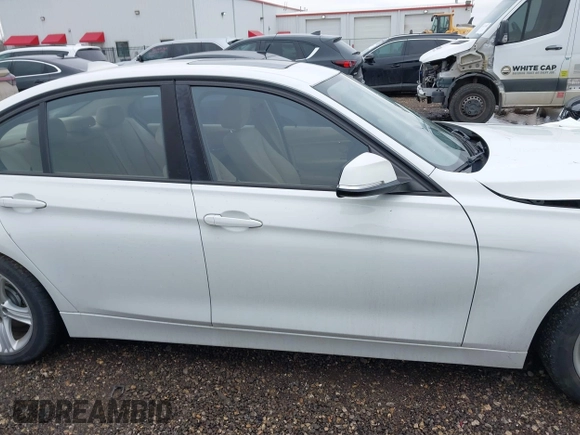 2014 BMW 3 Series 328i xDrive with VIN WBA3B5G50ENS06304, listed as a IAAI auction lot 41402704 with 139,943 mi miles. Bid and sale history available at carsss.com. Image 13.