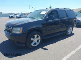2007 Chevrolet Tahoe LT with VIN 1GNFK13057J112892, listed as a IAAI auction lot 42723713 with 232,044 mi miles and . Bid and sale history available at DreamBid. Image 2.