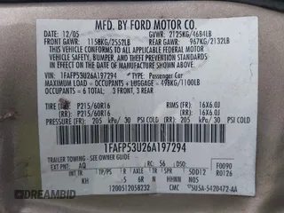 2006 Ford Taurus SE z VIN 1FAFP53U26A197294, wystawiony jako IAAI lot #41506334 z przebiegiem 180 411 mil mil oraz . Historia ofert i sprzedaży dostępna na DreamBid. Obrazek 9.
